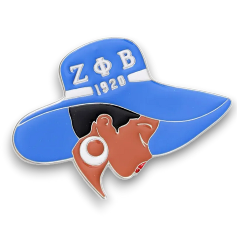 Alt Text for Image:
“A stylish ZΦB 1920 Signature Hat Brooch featuring a blue enamel hat with the letters ZΦB and 1920. The brooch is packaged in a clear protective pouch with a branded card that reads